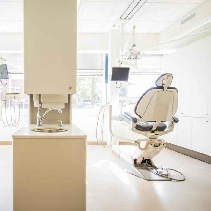 Dental surgery Dentist surgery with two chairs facing a window