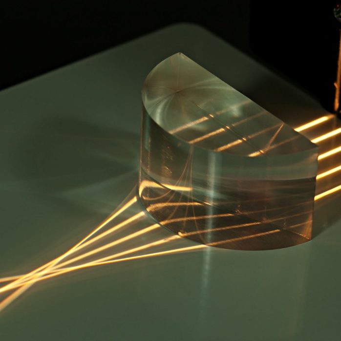 Light refraction experiment Axial aberration. Plano - convex lens focuses incoming rays. Outer lines shows axial aberration of lens.