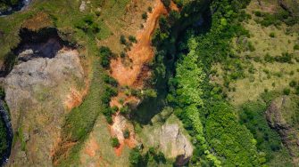 earth drone green birdeye view of green terrain taken on a drone