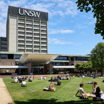Students relaxing on Library lawn at Kensington UNSW.