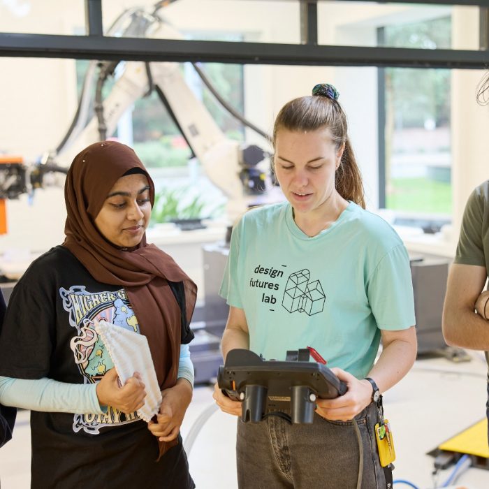 Students using technology in the Design Futures Lab at the School of Built Environment