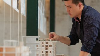 Student with architecture model