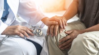 Parkinson's disease patient, Arthritis hand and knee pain or mental health care concept with geriatric doctor consulting examining elderly senior aged adult in medical exam clinic or hospital