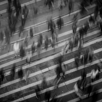 Wide angle aerial shot of a busy city crossing.