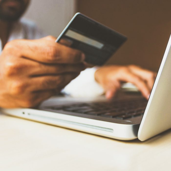 Stock photo of Business Man with a credit card by rupixen