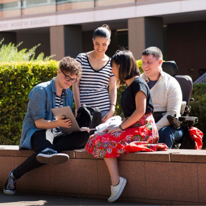 Four students near wall