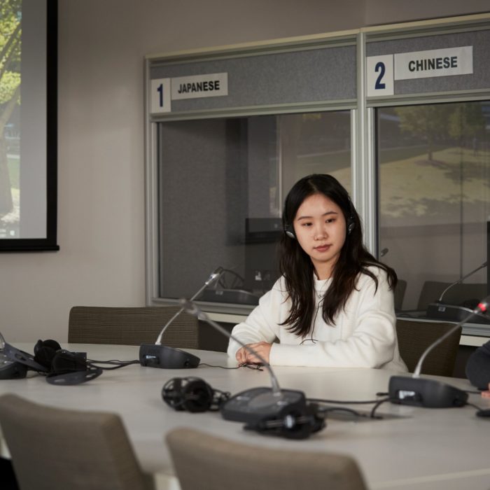 Students learning at the translation booth room at UNSW Kensignton campus.