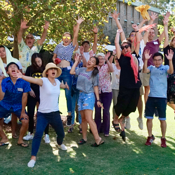 a group of students jumping