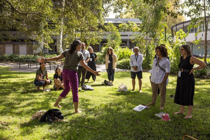 Guests at the Massive Action Sydney Unconvention interacting with Dr Tema Milstein from the Daily Delight~Disrupt project team 