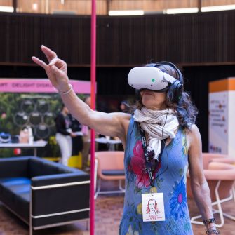A guest at the Massive Action Sydney Unconvention immersed in a BARC VR experience. 