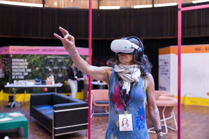 A guest at the Massive Action Sydney Unconvention immersed in a BARC VR experience. 