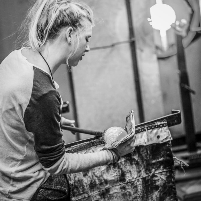 Blowing Glass Professional Caucasian Woman Working on a Vase.