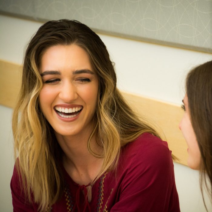 Two women chatting and smiling