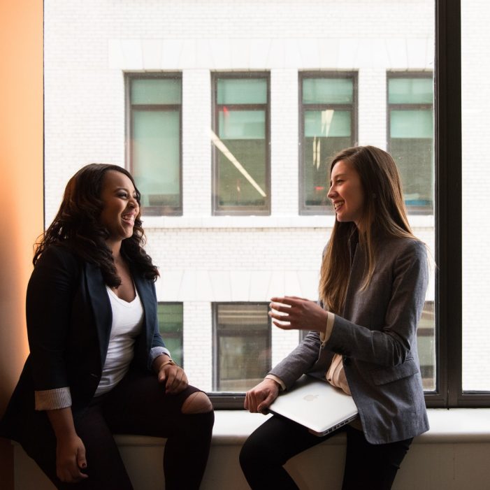 Two women chatting