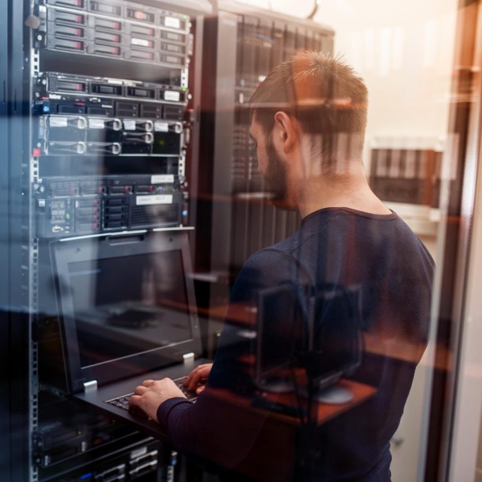 Man working at mainframe computer