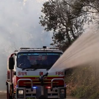 fire truck putting out bushfire