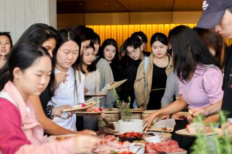 Students enjoying refreshments in the Clancy foyer after the Term 3 2024 O-Week Official Welcome