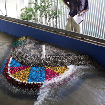 The Water Research Laboratory’s 3 m wave flume is one of the largest flumes in Australia. It is 32 m long by 3 m wide by 1.3 m deep and has a level floor. The wave generating paddle occupies 3 m of flume length, giving a useable length of 29 m. Bathymetry is added (when required) by installing either a sand or plywood bed to the required slope.