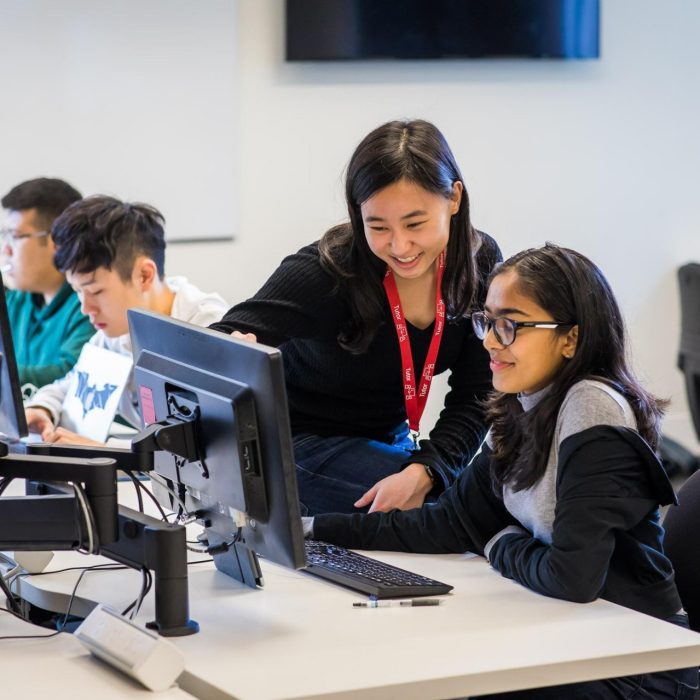 Students and teacher in a computer lab