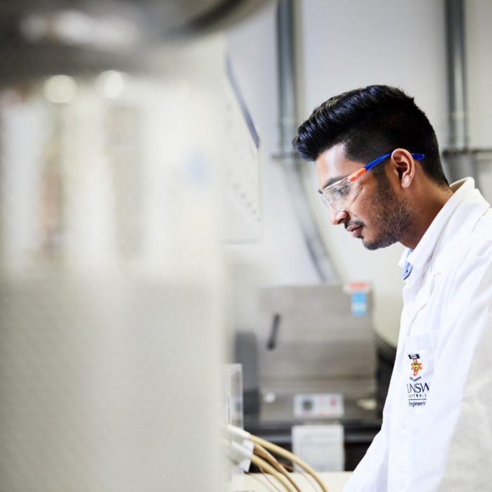 UNSW engineering student wearing safety gear in workshop