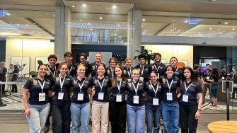 group photo of students wearing black polo shirts at 2024 national mining games