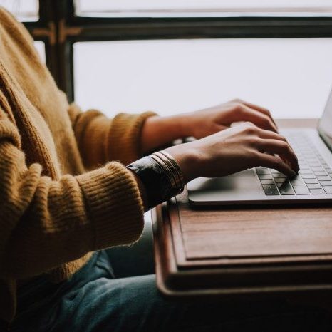 Photo of person accessing fact sheets on the UNSW Legal and Compliance website