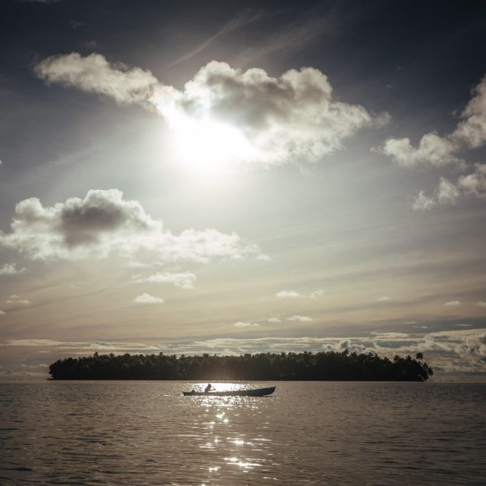 Beyond the shore of Buka, deep in the Pacific Ocean there is no telecommunications and almost no electric power, lie a small cluster of atolls called the Carteret Islands. With a combined landmass of a little over half a square kilometer, these islands are home to 2,000 islanders who live a simplified rural lifestyle where they fish, grow food, build their homes, and rely on the resources available to them on the miniature islands.The communities who live in the tropical atolls are among the most economically, socially and physically disadvantaged populations in the Autonomous Region of Bougainville. This can be due to a number of factors such as high population density; low income levels; poor access to services; land shortages and diminishing crop yields. These factors are further compounded by the negative effects posed by increased climate change and other occasional hazards such as tsunamis which can easily rip through the shallow islands.