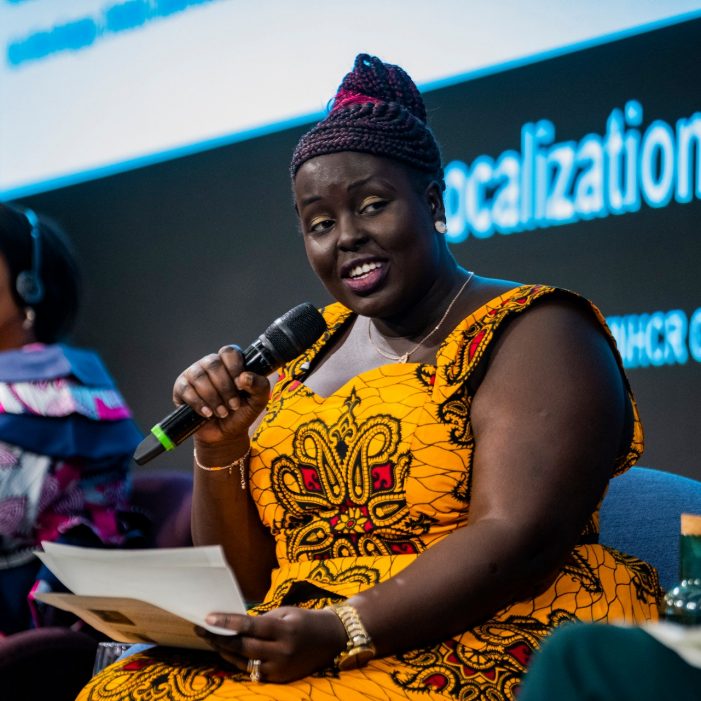 Delegates to the 2022 UNHCR Global Consultations with NGOs in Geneva take part in a panel discussion on “Engaging with Displaced Women-Led Organizations”. The discussion was moderated by Apojok Biar (speaking), who chairs the Women, Gender and Diversity Working Group of the civil society network Asia Pacific Refugee Rights Network. ; The 2022 UNHCR Global Consultations with NGOs took place in Geneva and online in hybrid format on 7-10 June with the twin themes “Climate Action” and “Localization”. The annual talks provide an important forum for debate on global and regional themes and an opportunity to explore fresh collaboration on advocacy and operational issues. More than 500 representatives from around the world took part in the meeting, co-organized by UNHCR and the International Council of Voluntary Agencies.