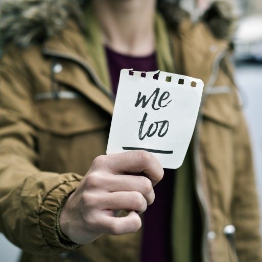 Person holding a metoo sign