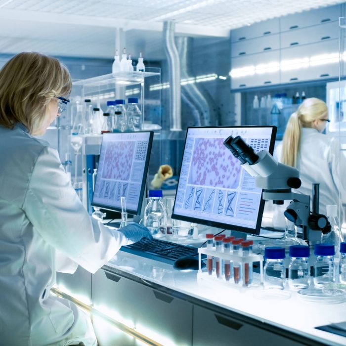 Photo of scientists working in modern laboratory