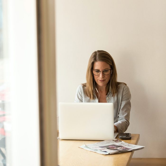 Woman sitting at laptop