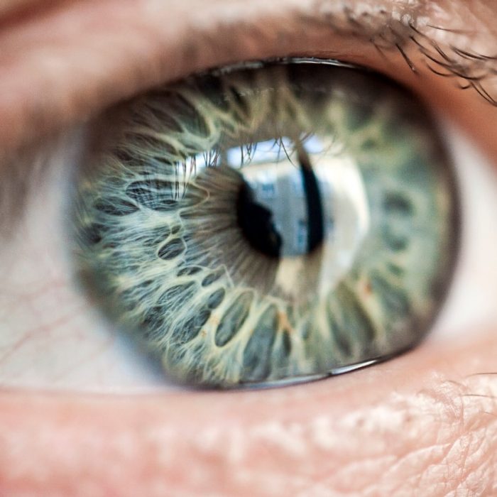 Very close macro photograph of a human eye with very special patterned iris and shallow depth of field