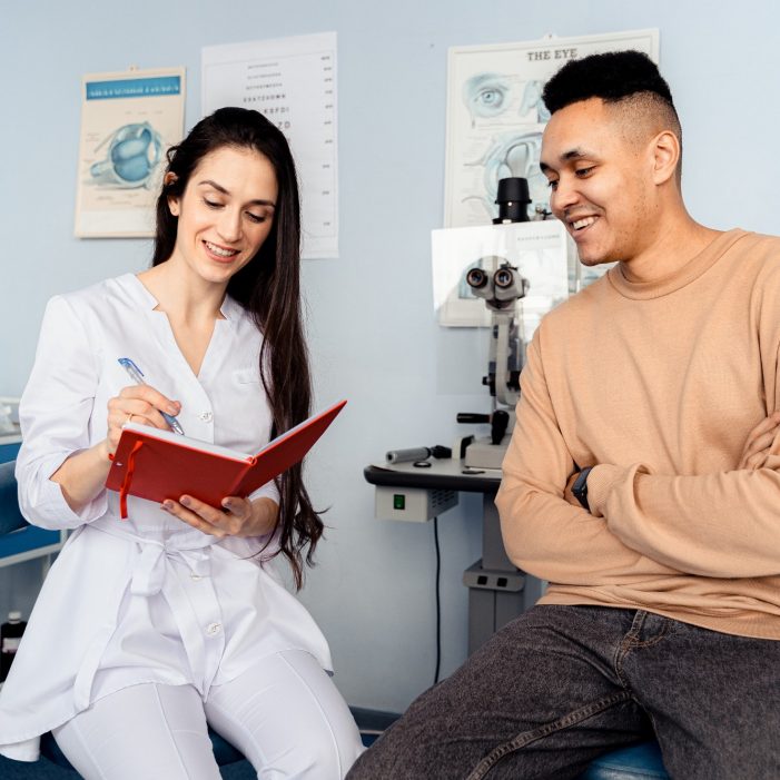 Optometrist with a patient