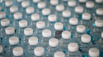 multiple rows of plastic bottles of water