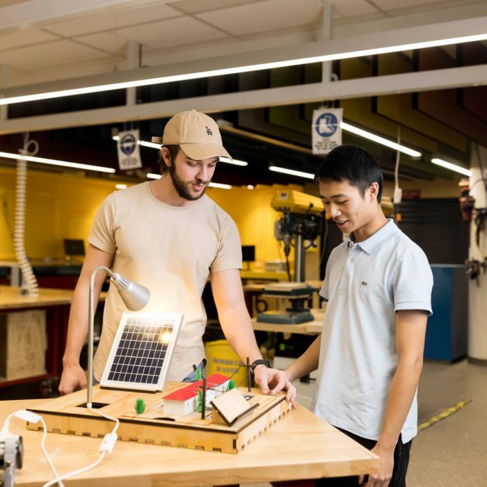 Students working on practical renewable energy design projects