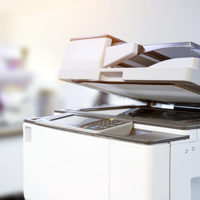 Copier printer, Close up the photocopier or photocopy machine office equipment workplace for scanner or scanning document and printing or copy paper duplicate and Xerox.