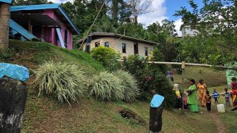 women and children outdoors in a pacific setting