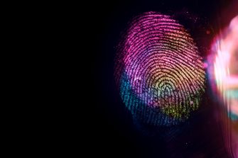 Close up beautiful abstract multi colored fingerprint on  background texture for design. Macro photography view.