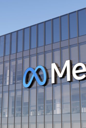 Menlo Park, California, USA. January 9, 2022. Editorial Use Only, 3D CGI. Meta Signage Logo on Top of Glass Building. Metaverse Workplace Technology Service Company High-rise Office Headquarters.