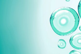 Sky blue abstract bubbles banner with copy space left.3d illustration micellar water. Reprodoctology, petrium dishes,oxygen molecules.Laboratory research and scientific.Transparent liquid, human eggs with nuclei.