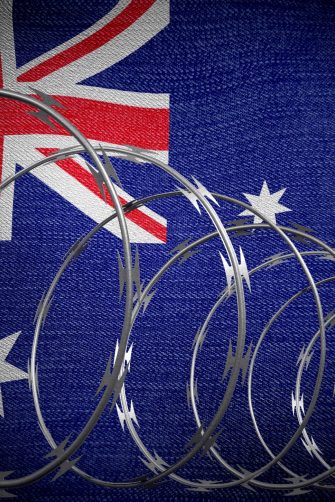 Spiral barbed wire and flag of Australia - 3d illustration