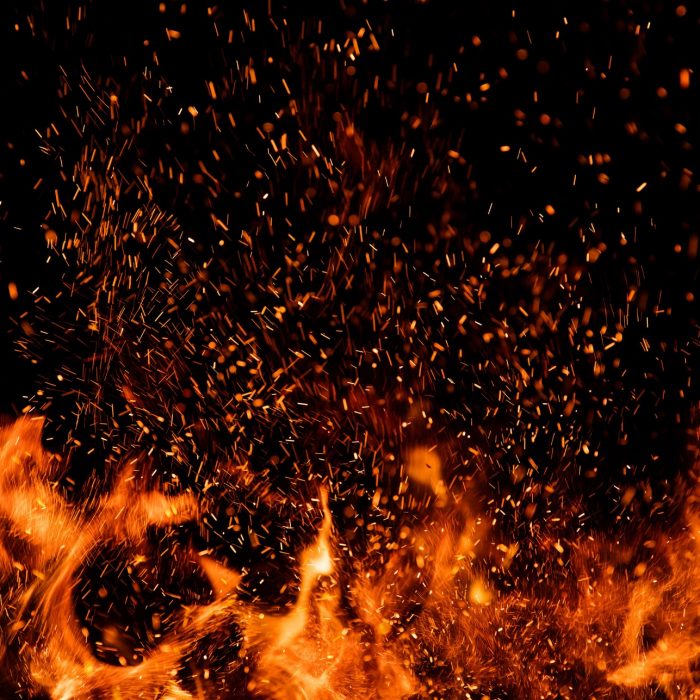 Detail of fire sparks isolated on black background