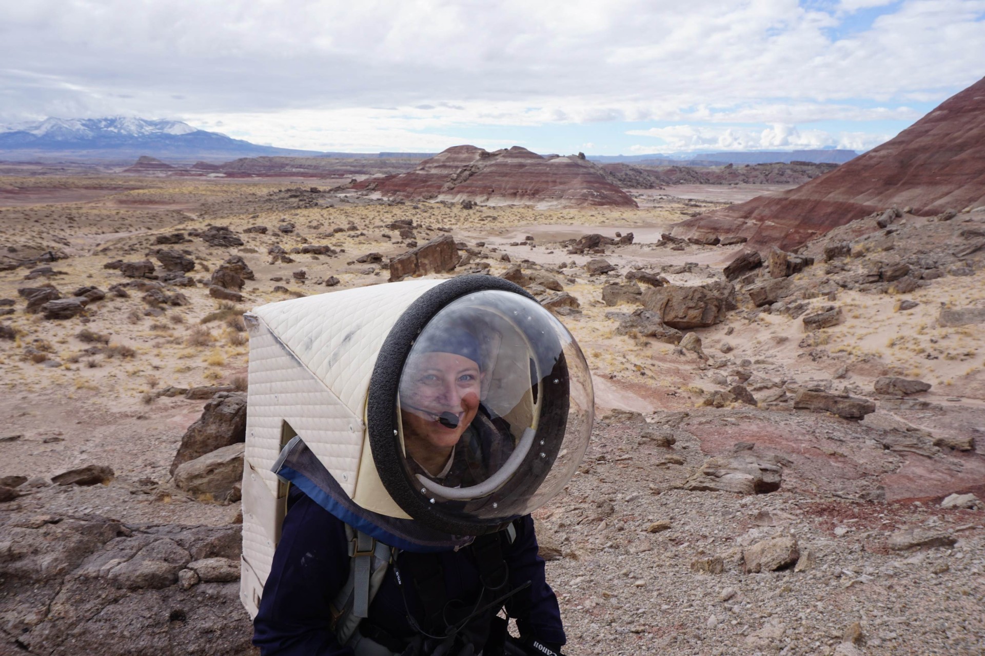 Clare Fletcher suited up conducting fieldwork