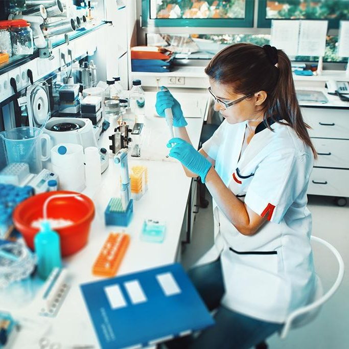 Lab assistant performing test