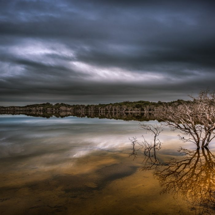 Storm clouds over lake