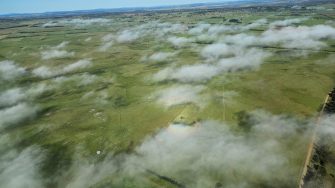 Low cloud over farm land