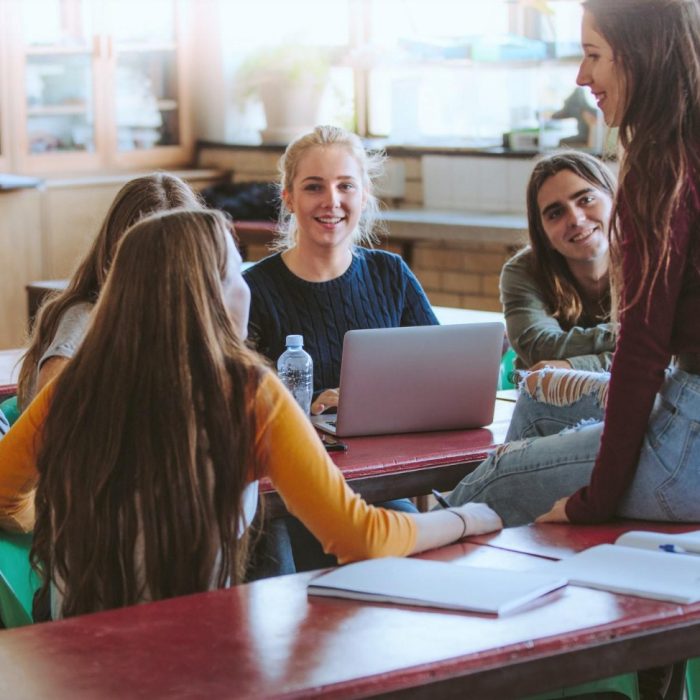 Group of students in classroom talking