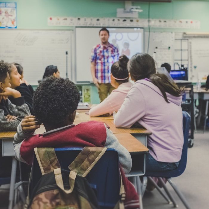 students in classroom with teacher