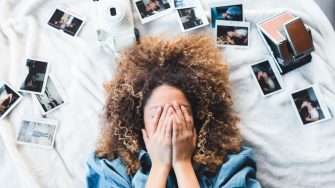 Woman surrounded by photos