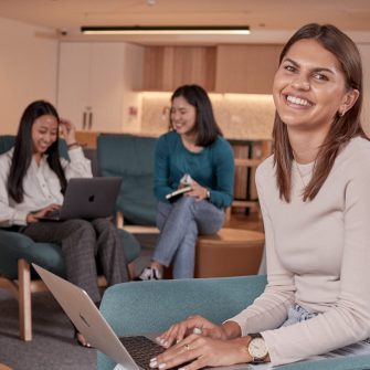 Students relaxing and studying in the common lounge at UNSW Kensington accommodation.